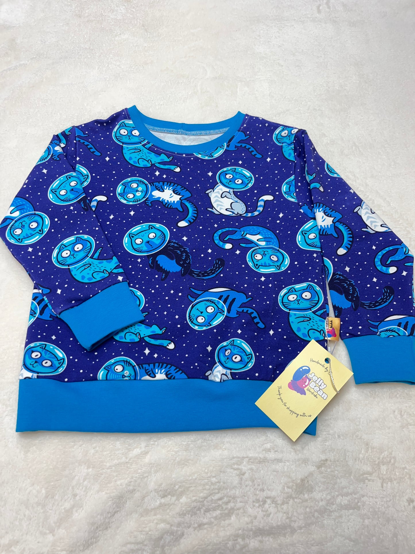 Bold blue background, Blue cats in space