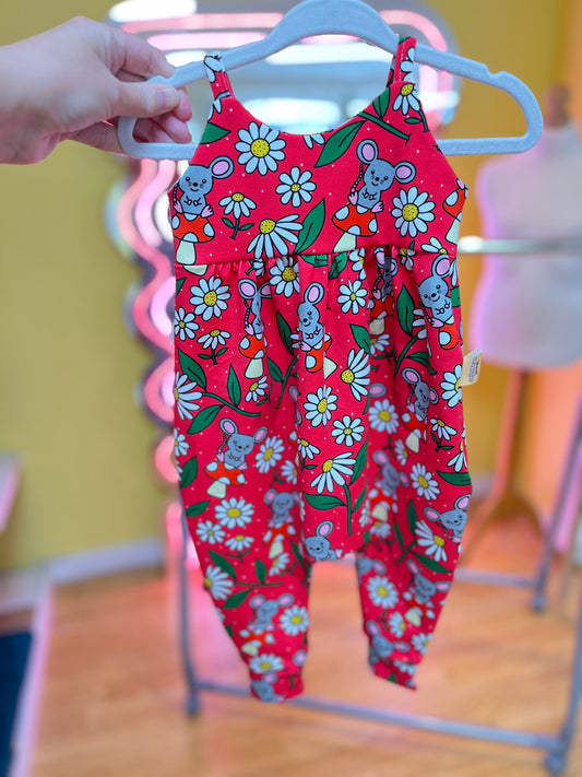bright and bold red romper featuring cut mice and toadstools and daisies 